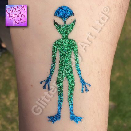 space alien glitter tattoo created using temporary tattoo stencil for boys