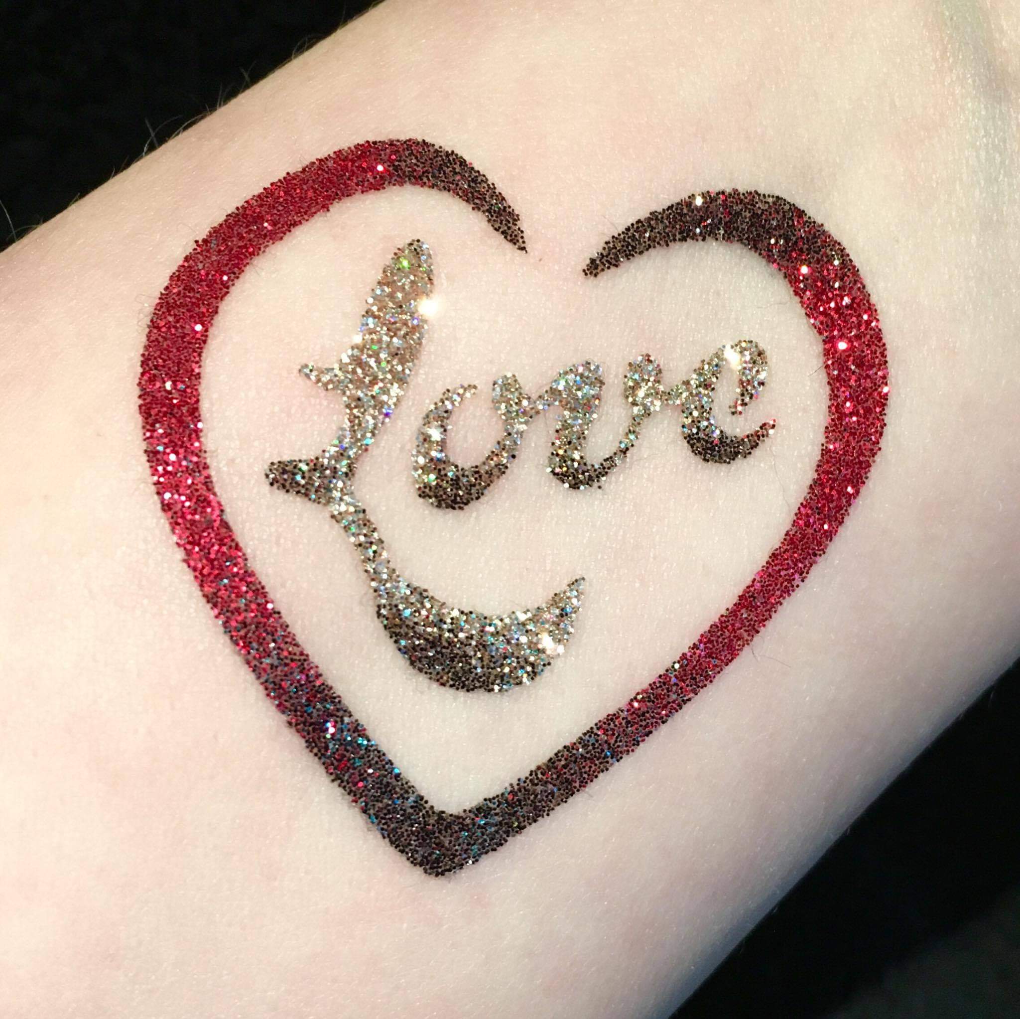 love heart temporary tattoo with love wordart written inside it