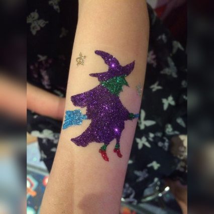 Halloween wicked witch on a broomstick temporary tattoo stencil
